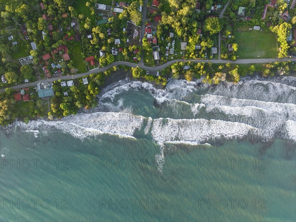 Top-down, aerial view, view of settlement and houses on the coast, Cahuita, Limón, Costa Rica,