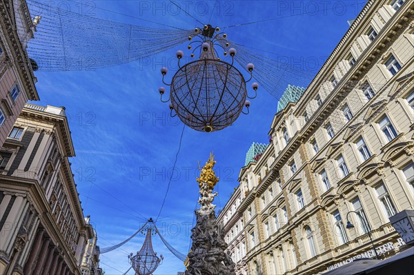 Christmas lights in the pedestrian zone, below the plague column column, Graben, Vienna, Austria,