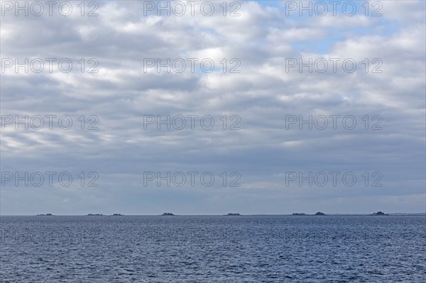 Clouds over Hallig Langeneß, North Frisia, Schleswig-Holstein, Germany, Europe