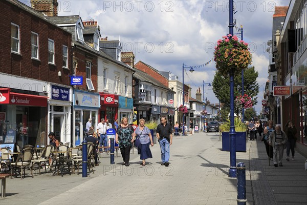 Shops and shoppers pedestrianised Hamilton Road, Felixstowe, Suffolk, England, UK