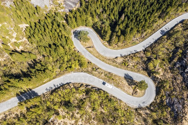 Aerial view of mountain road fv 44 west of Flekkefjord, camper van, norwegian southern coast,