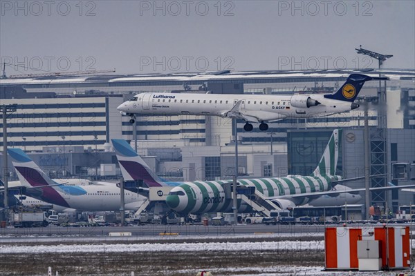 Lufthansa Cityline, Bombardier CRJ-900 approaching Frankfurt FRA airport, terminal building,
