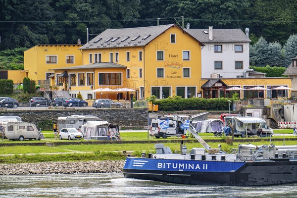 Cargo ship, tanker, on the Rhine in the Upper Middle Rhine Valley, near the Loreley Rock, campsite
