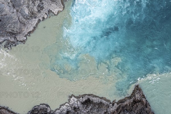 Confluence of river Rio Baker and Rio Neff, aerial view, muddy water of Rio Neff merges with