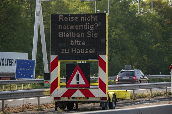 German-Dutch border at Emmerich-Elten, A3 motorway, signal board asks travellers to only make