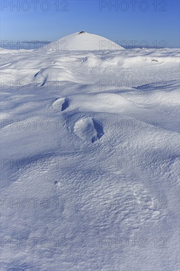 Morning light on a snowy lava field, lake, volcanic crater, snow, winter, Berserkjahraun,