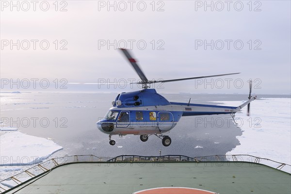 Helicopter takeofft on deck of Icebreaker Kapitan Khlebnikov, Snow hill island, Weddel Sea,