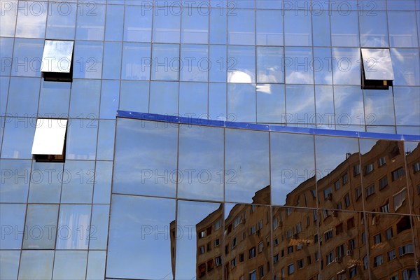 Small Wallachia, town of Drobeta Turnu Severin, building with glass façade by Rom Telekom, Romania,