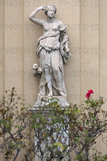 Sculpture of a woman with a multi-headed snake, in the garden of Palazzo Reale, Via Balbi, 10,