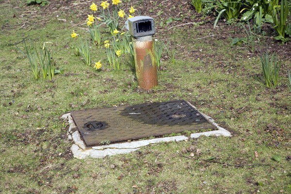 Garden septic tank vent access and ventilation, England, UK