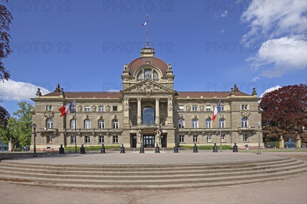 Palais du Rhin built in 1889 with open staircase, former imperial palace, French national flag,