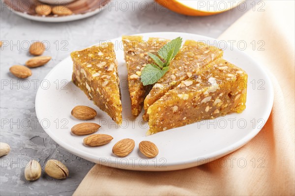 Traditional turkish candy cezerye made from caramelised melon, roasted walnuts, hazelnuts, cashew,