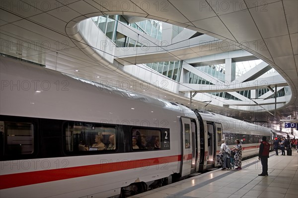 ICE at the centre platform with the large opening to the glass dome, long-distance train station,