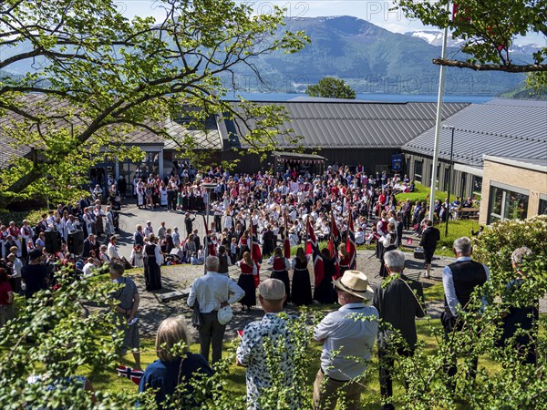 Norwegian national day celebration, 17. may, parade with music, norwegian flags, village Rosendal,