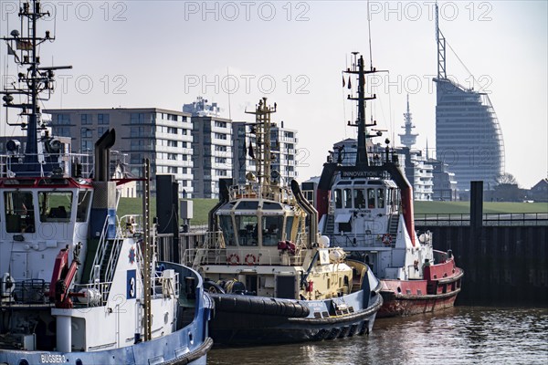 Harbour tugs, tugboats, towboats, at the tugboat pier, Atlantic Sail City Hotel, in the seaport of