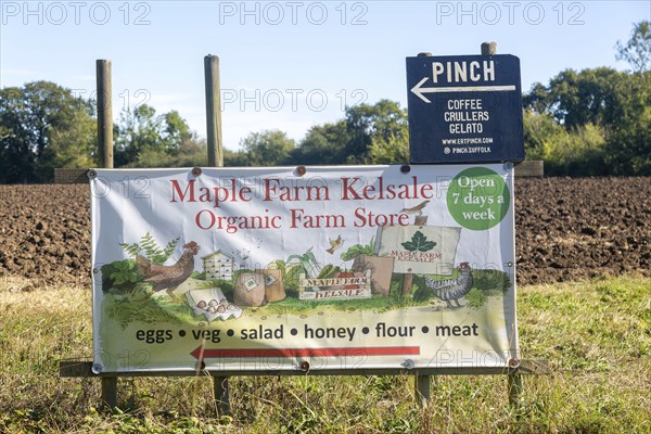 Banner sign for Maple Farm organic farm store shop, Kelsale, Suffolk, England, UK