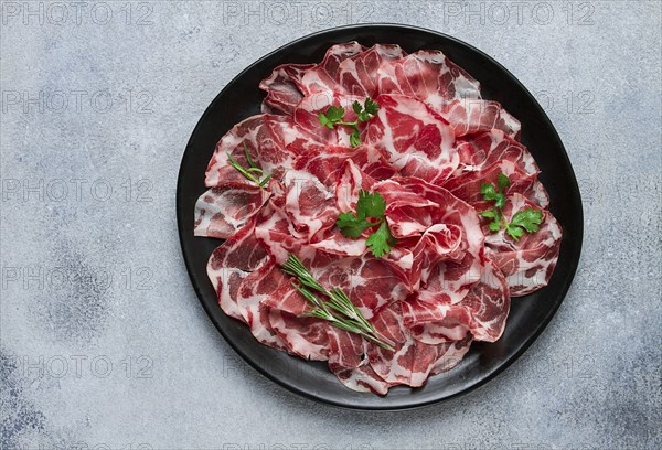 Sliced cured ham, prosciutto, italian dish, delicacy, parma ham, top view, no people