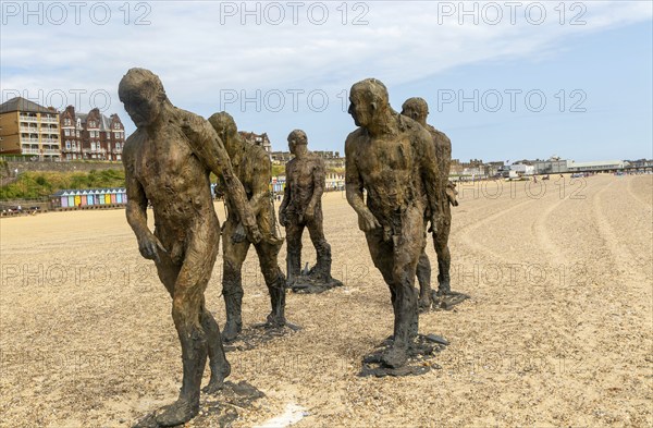 'Walking Men' artwork bronze sculptures by Laurence Edwards, South Beach, Lowestoft, Suffolk,