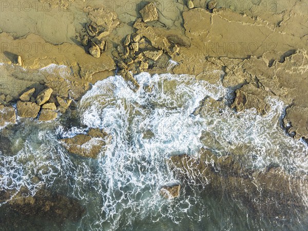 Breakers at the shore of the Atlantic Ocean near Cape Trafalgar. Aerial view. Drone shot. Costa de