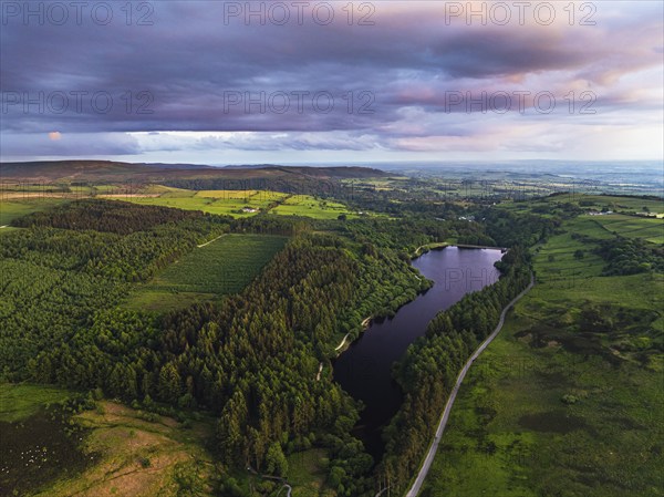 Sunset over Cod Beck Reservoir from a drone, North York Moors National Park, North Yorkshire,