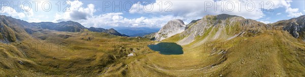 Aerial view, Alpine panorama, mountain hut Obstanserseehütte at the mountain lake Obstansersee,