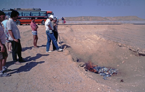 Waste is burnt in the desert, Rotel-Tours bus, passengers, waste incineration, Libyan Desert,
