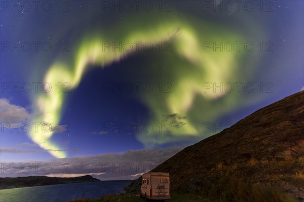 Northern Lights, (Aurora borealis) at a fjord in the Barents Sea near Bugoynes, September 2024,