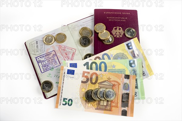 Banknotes, symbolic photo of bribery, passports of the Federal Republic of Germany