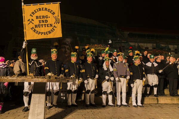 Miners pay their respects on the castle square Traditional mining and smelting parade in Freiberg.