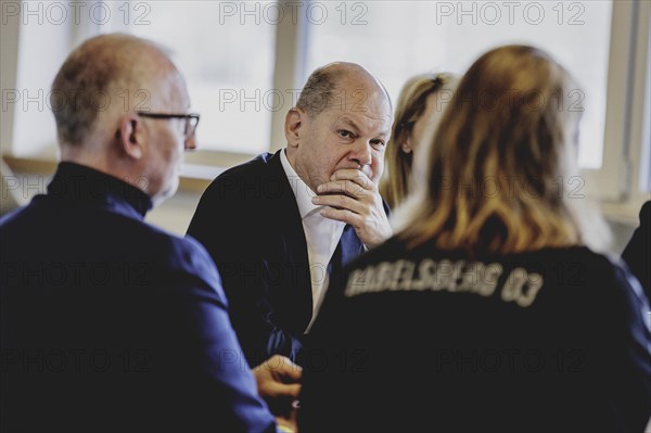 Olaf Scholz (SPD), Federal Chancellor, at a meeting with migrants and people involved in the field