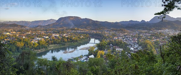 Panorama over Luang Prabang with Nam Khan River and Wat Phol Pao in the background, Laos, Asia