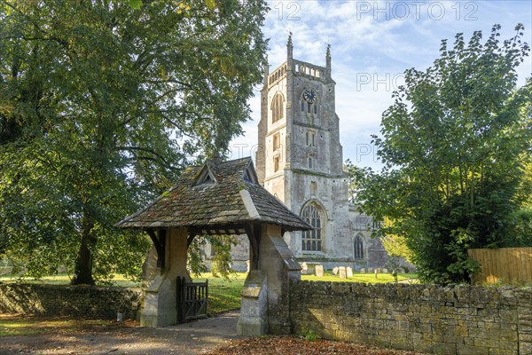 Lychgate and tower of village parish church of Saint Mary, Kempsford, Gloucestershire, England, UK