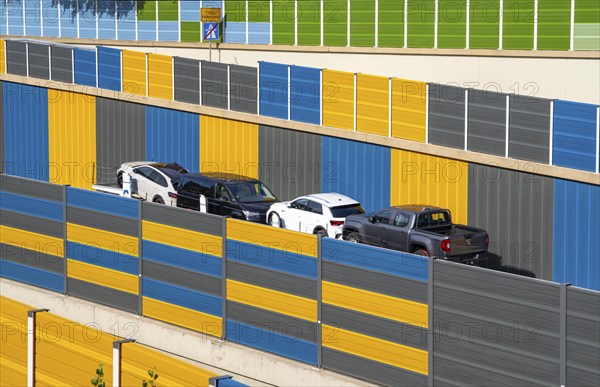 Colourful noise barriers on the A52 motorway, at the Essen-Rüttenscheid junction, the noise