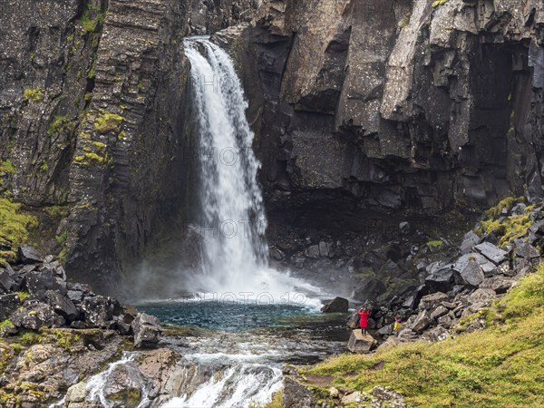 Waterfall Folaldafoss, at Öxi Mountain Road 939, tourists, East Fjords, Iceland, Europe