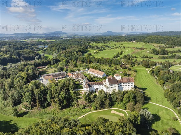 Aerial view of Langenstein Castle near Eigeltingen with surrounding golf course, the Hegau