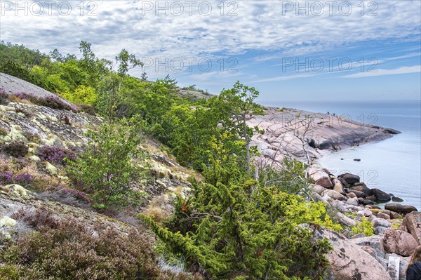 Bizarre coastal landscape of granite rocks on the Blue Maiden (Bla Jungfrun), an island and