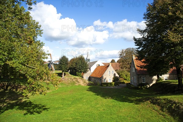 Private houses, circular route, ramparts, windmill, fortress, Bourtange, Netherlands