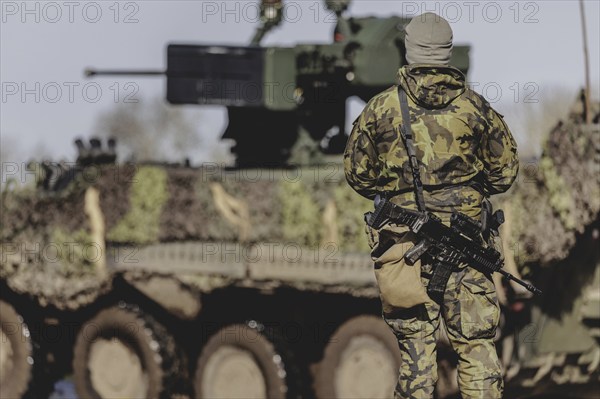 A soldier with a rifle, taken during the military exercise 'Wettiner Schwert' with German and Czech