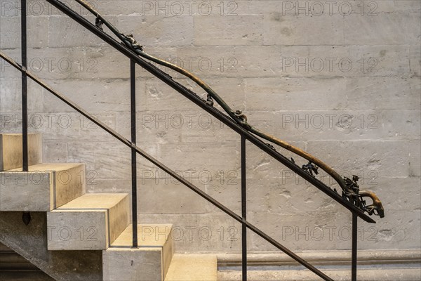 Metal figures on the banister leading to the gallery in Naumburg Cathedral, Saxony-Anhalt, Germany,