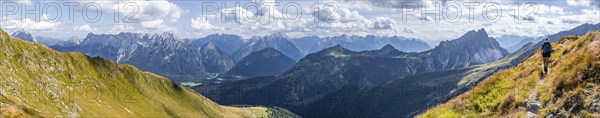 Alpine panorama, hiker on the Carnic High Trail, Carnic main ridge, Carnic Alps, Carinthia,