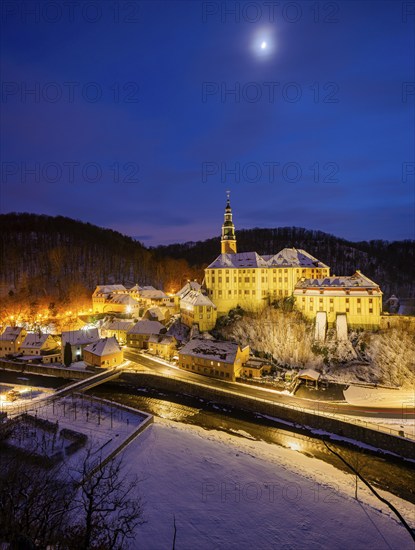 Winter evening in the Müglitz valley, impressively illuminated Weesenstein Castle at the blue hour,