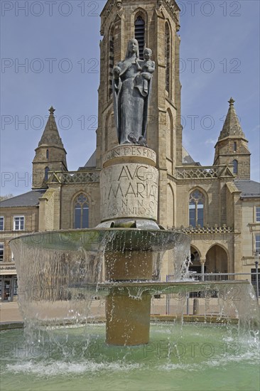 Marienbrunnen with Madonna figure built in 1954 and St Ludwig Church, inscription, Maria, Großer