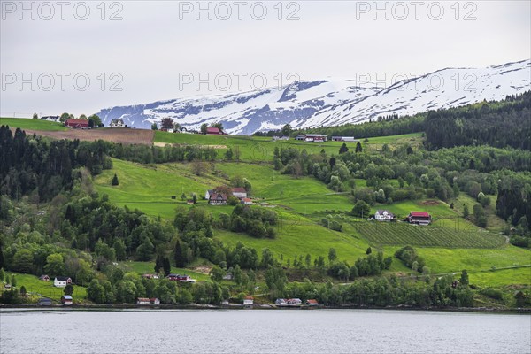 Mountains and Fjord over Norwegian Village, Olden, Innvikfjorden, Norway, Europe