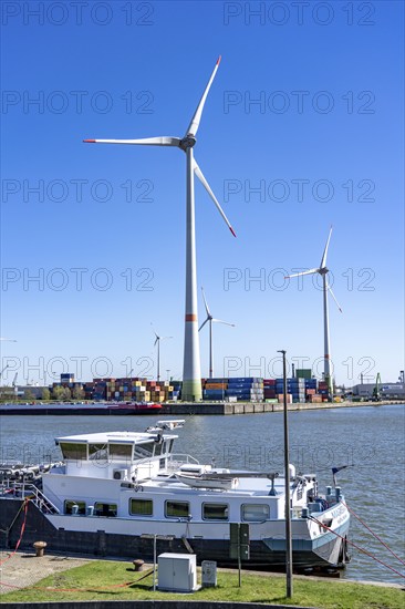 The port of Antwerp, on the Scheldt, is the second largest seaport in Europe, Wind turbines in the