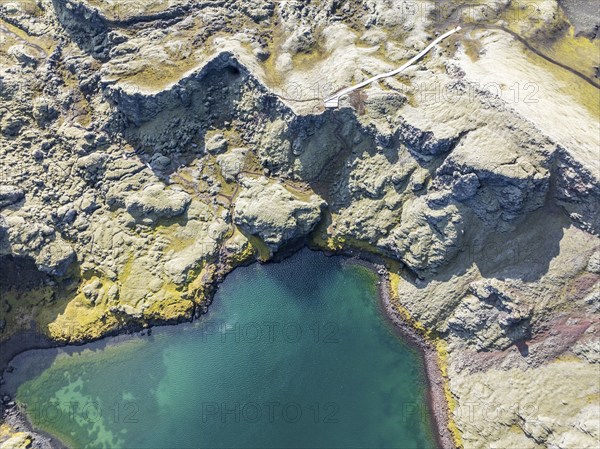 Lake in Tjarnargigur crater, moss-covered Laki crater or Lakagígar, series of craters, aerial view,