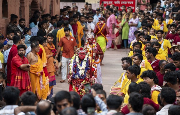 GUWAHATI, INDIA, AUGUST 19: Priests dance in the beat of Dhol (Drum) during the annual