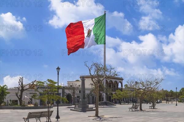 Los Cabos San Jose Del Cabo, Mexico, Mexican tricolor national striped flag proudly waving at mast,