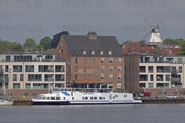 View of the harbour from the garden of the youth hostel, excursion boat, houses, Amanda windmill,