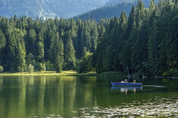 Spitzingsee, family excursion in an electric boat on the mountain lake, municipality of Schliersee,
