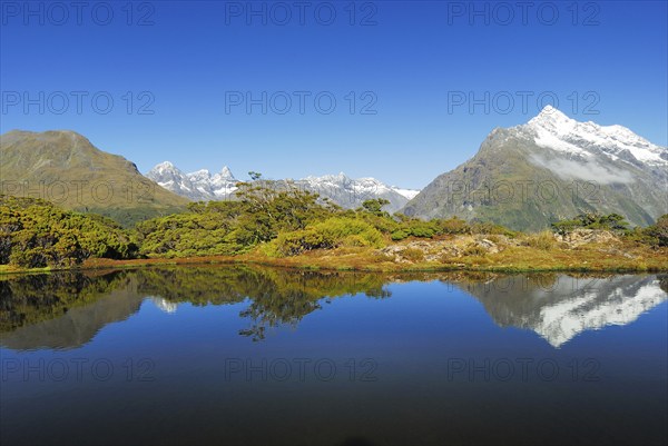 Key Summit with reflection of Mt Christina, Fiordland National Park, World Heritage Site South West